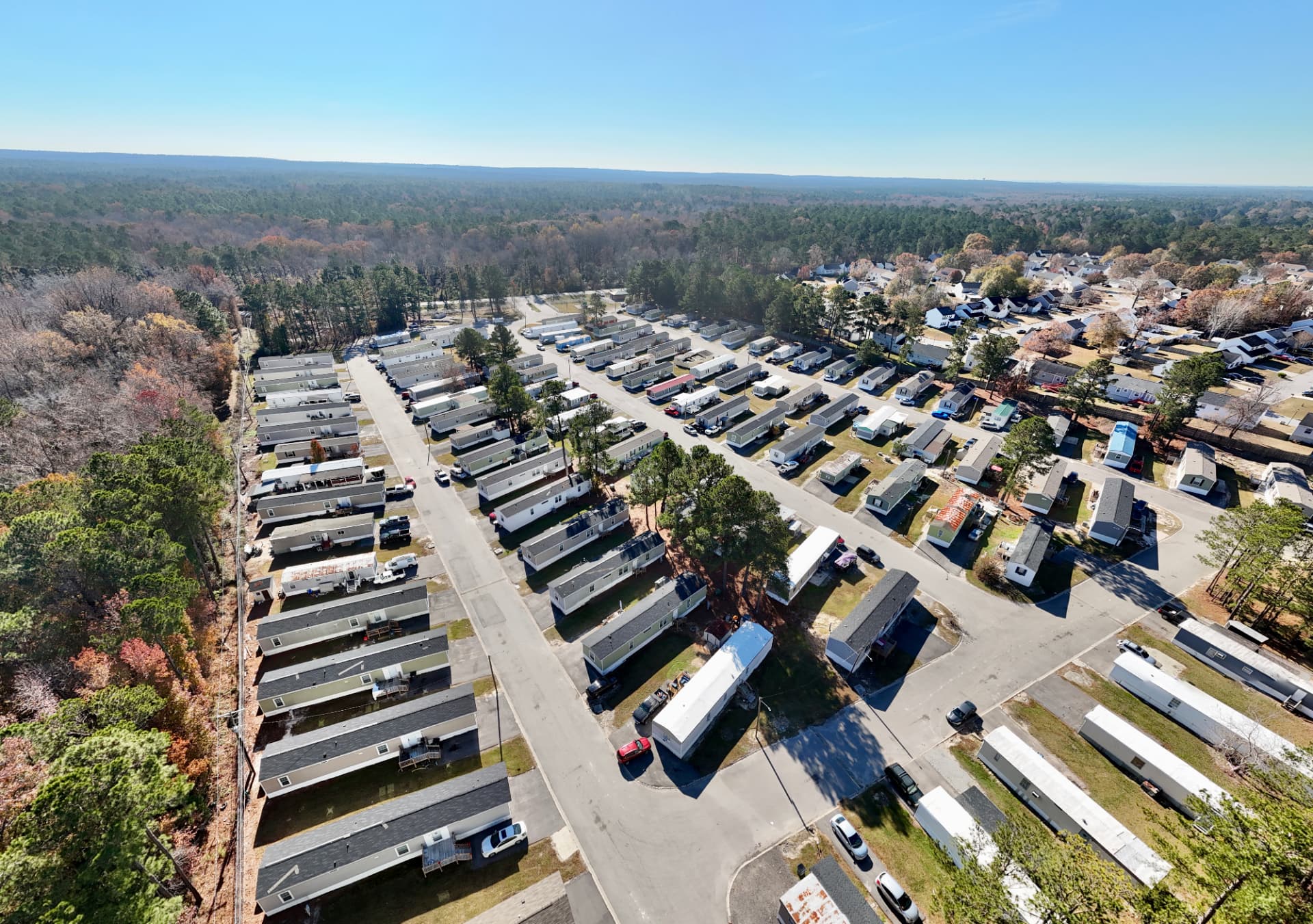 Aerial view of an MH Estates manufactured home community